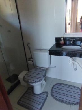 Suíte com piscina em Costa Azul